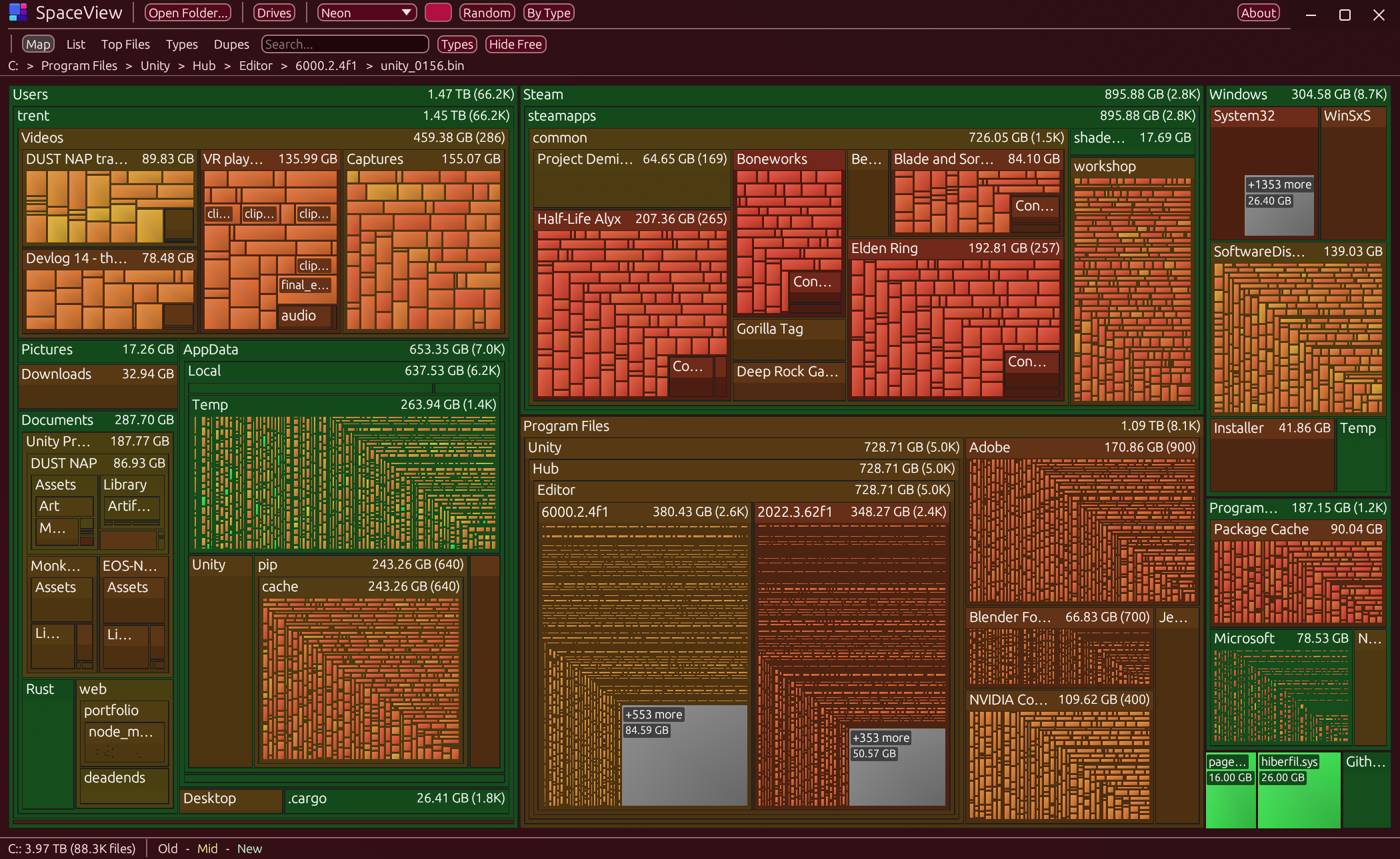 SpaceView age map: newest files glow, old junk fades, Deep Space theme with the Neon palette